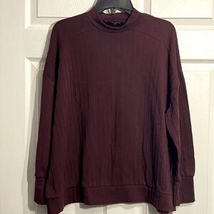 Lane Bryant women’s 18/20 Burgundy mock neck top.